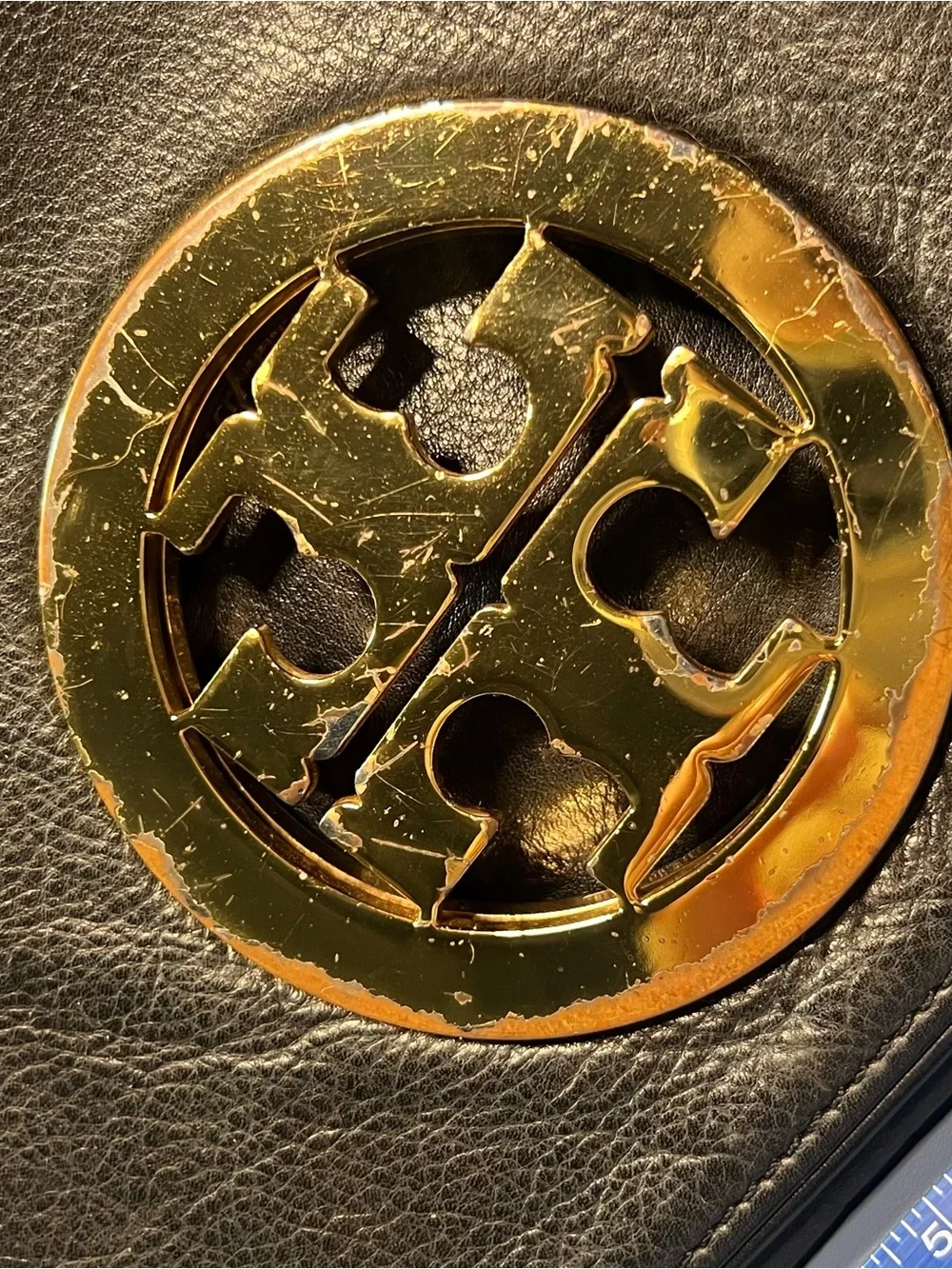 Pre-loved Tory Burch Black Leather clutch with Gold hardware